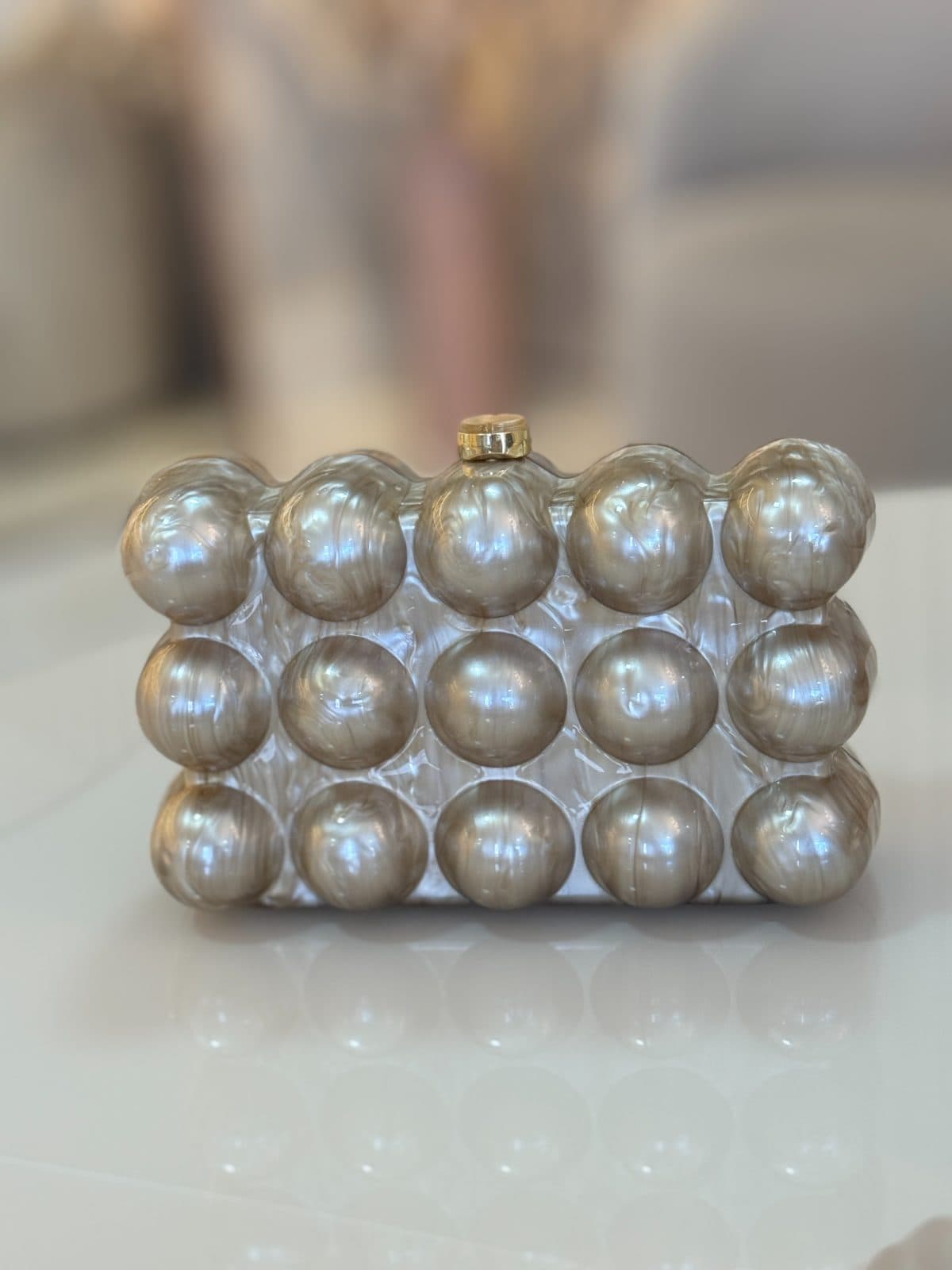 Clutch de madrepérola champagne