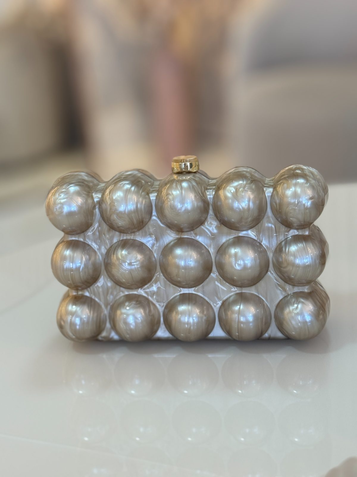 Clutch de madrepérola champagne